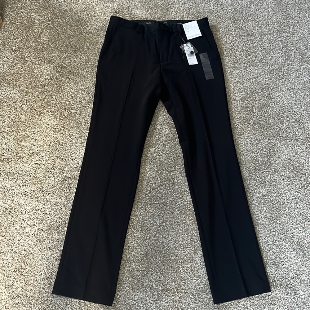 Never worn Calvin Klein body fit dress pants